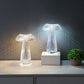 A pair of elegant crystal mushroom lamps, with a sleek ribbed design, emits soft white light that radiates beautifully against a dark background. One lamp sits directly on the surface, while the other is elevated on a white platform, adding a layered aesthetic to the display. These ambient lights cast mesmerizing reflections, creating a sophisticated and modern atmosphere. Ideal for accentuating decor, these lamps bring a touch of elegance to any contemporary setting.